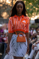 WOMEN'S STRIPED ORANGE GOLFER